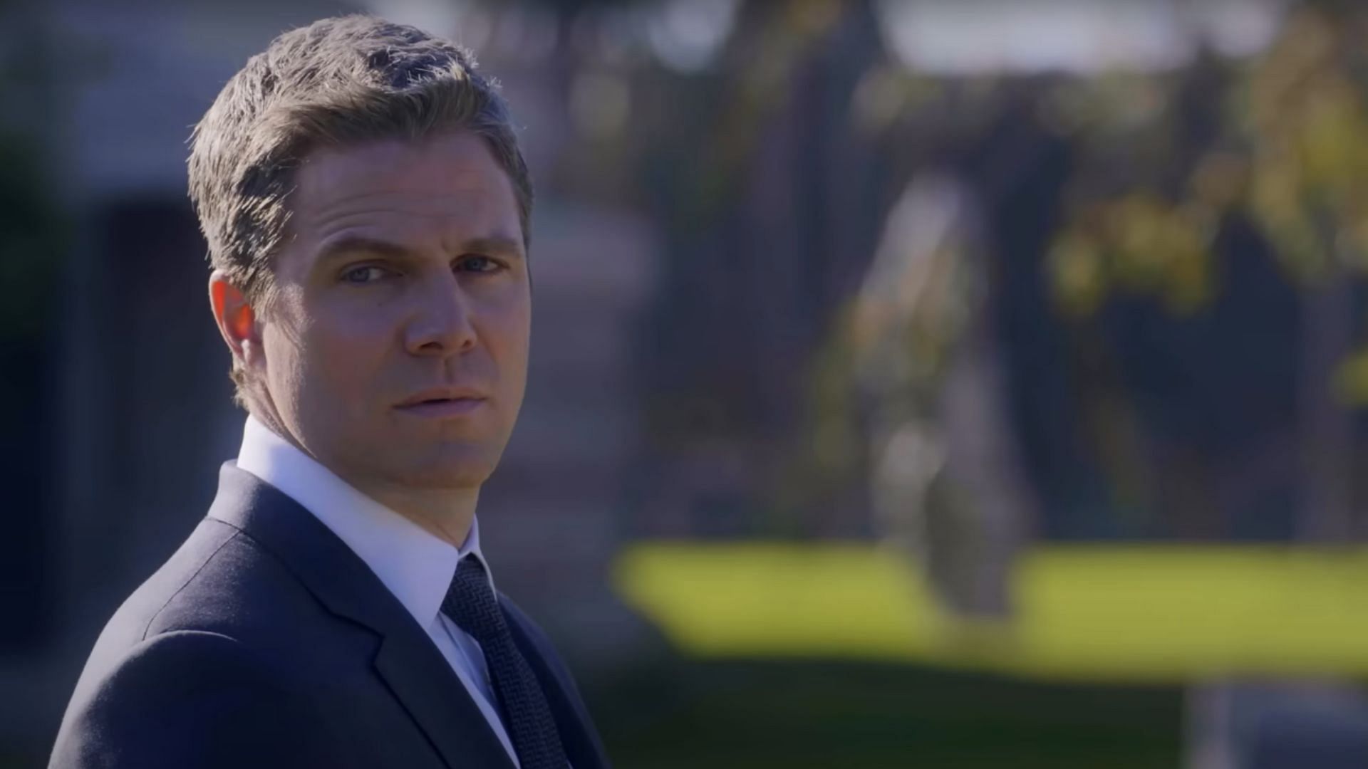 Amell as Ted Black (Image via YouTube/Suits Official)